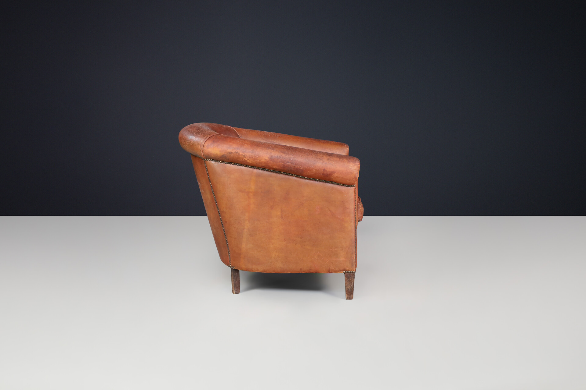 Antique Art deco Patinated scheepskin leather Lounge Chair, France 1940 Early-20th century