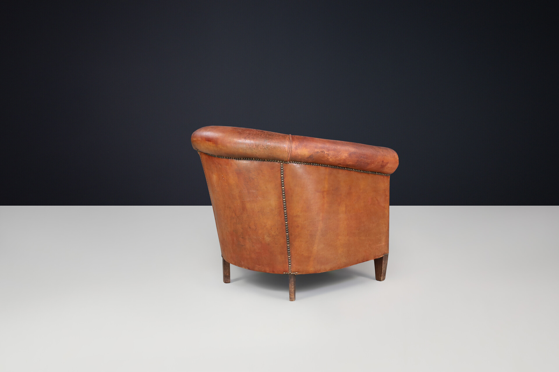 Antique Art deco Patinated scheepskin leather Lounge Chair, France 1940 Early-20th century