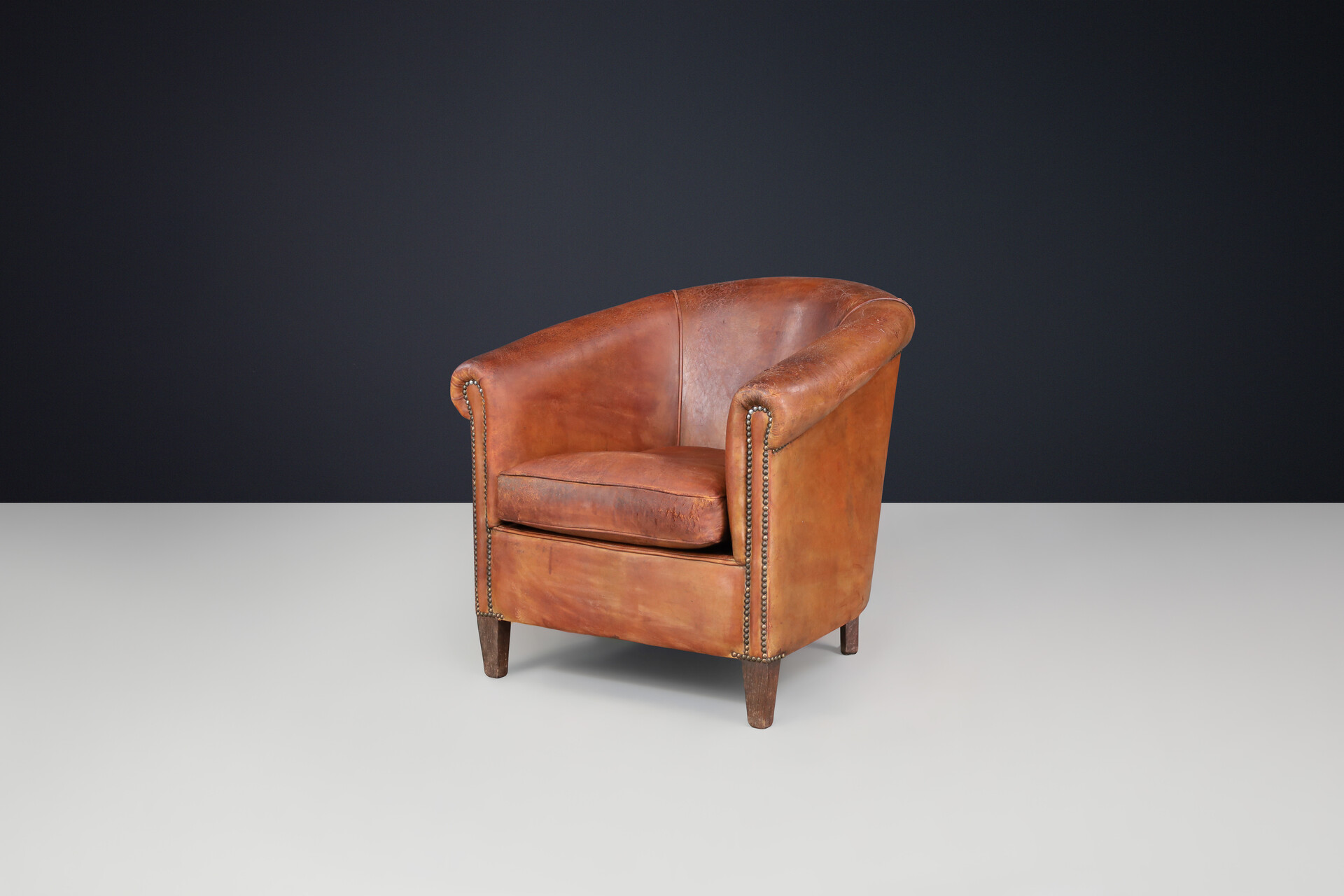 Antique Art deco Patinated scheepskin leather Lounge Chair, France 1940 Early-20th century