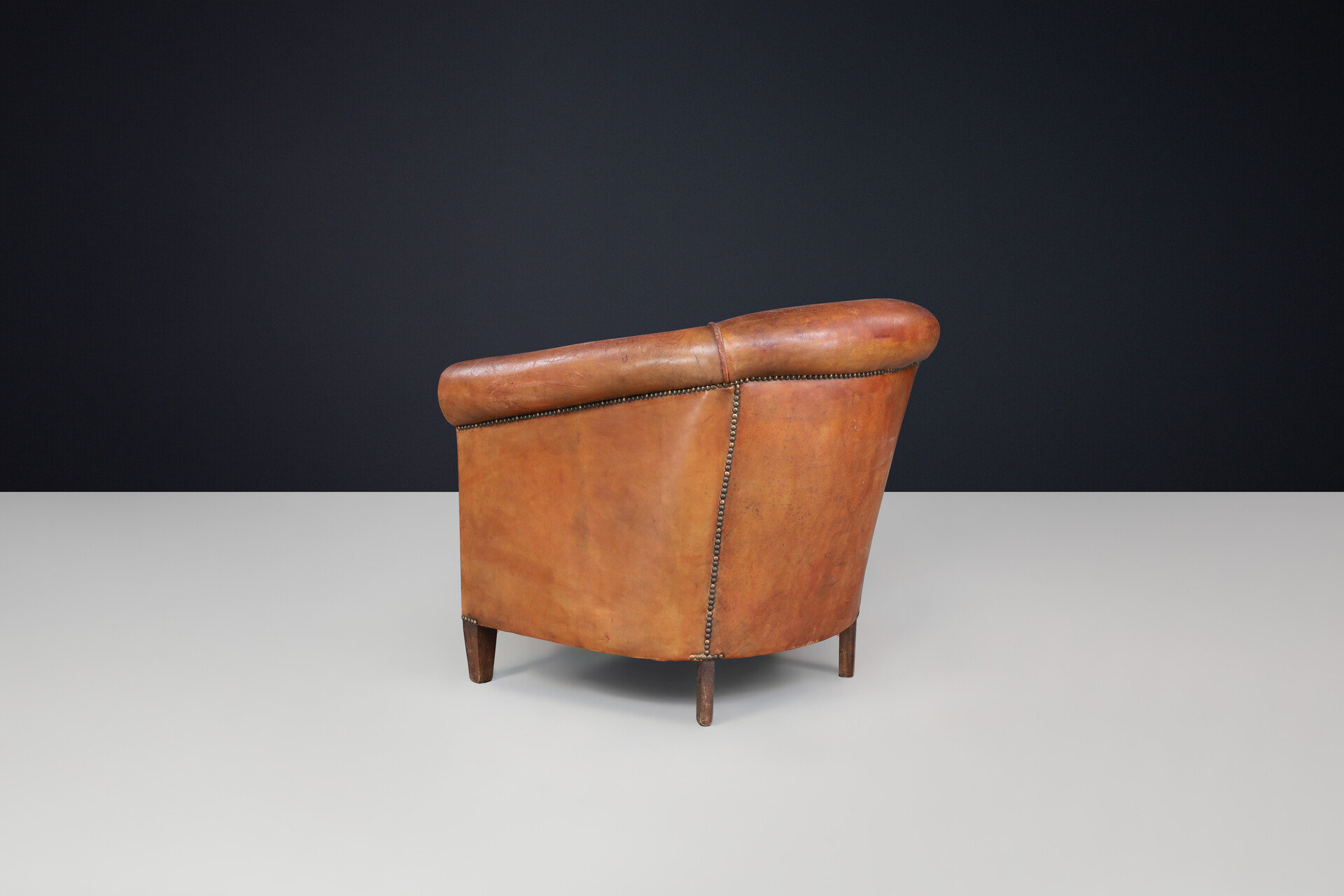 Antique Art deco Patinated scheepskin leather Lounge Chair, France 1940 Early-20th century