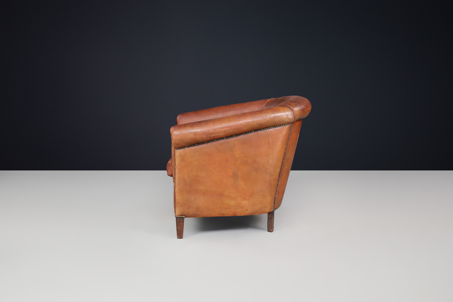 Antique Art deco Patinated scheepskin leather Lounge Chair, France 1940 Early-20th century