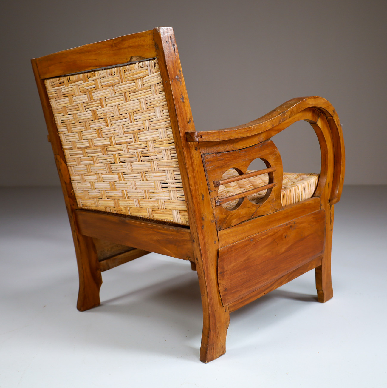 rattan and wood armchair