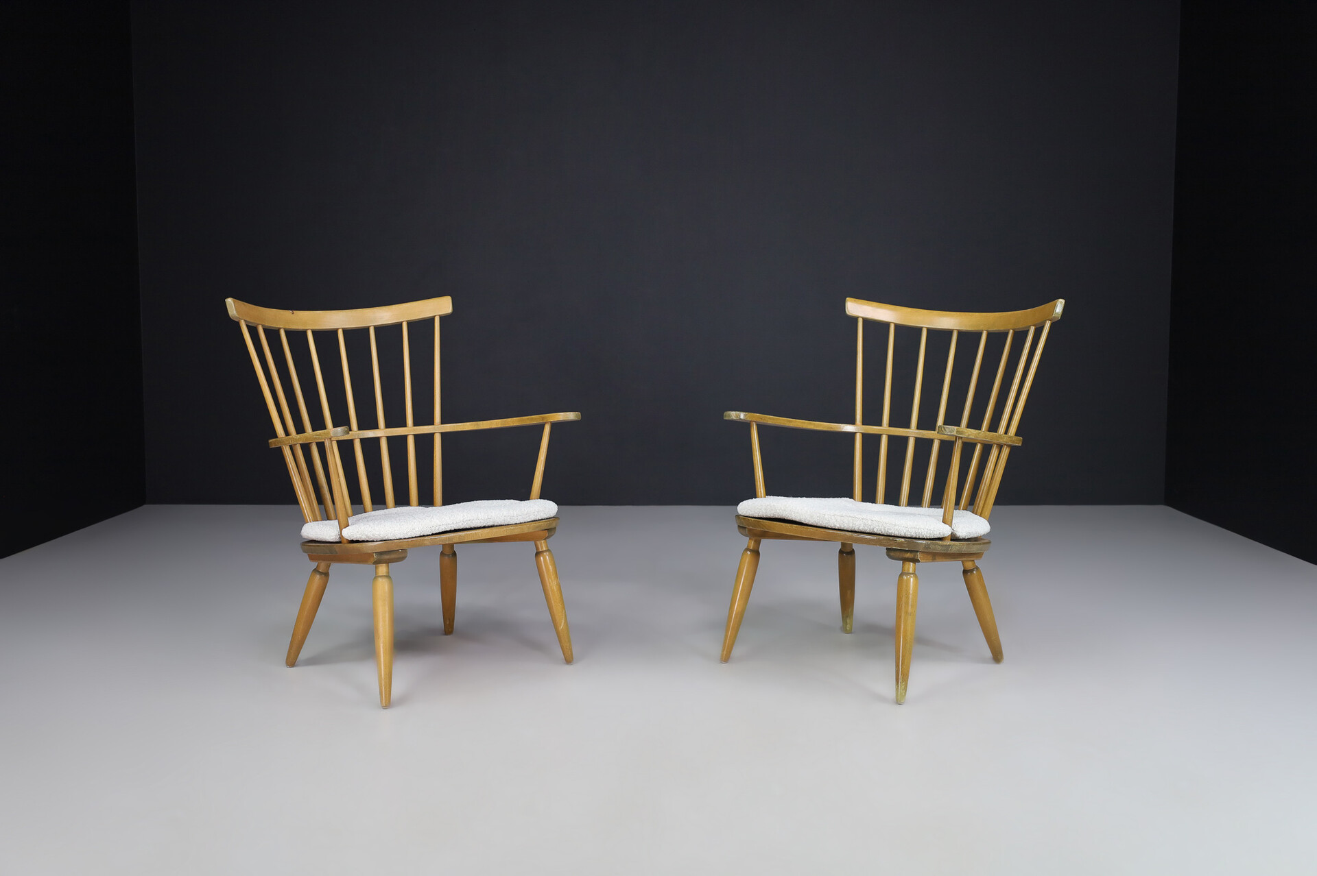 Mid century modern Beechwood Armchairs with New Bouclé cushions for Altheim by Franz Schuster 1950s Austria. Mid-20th century