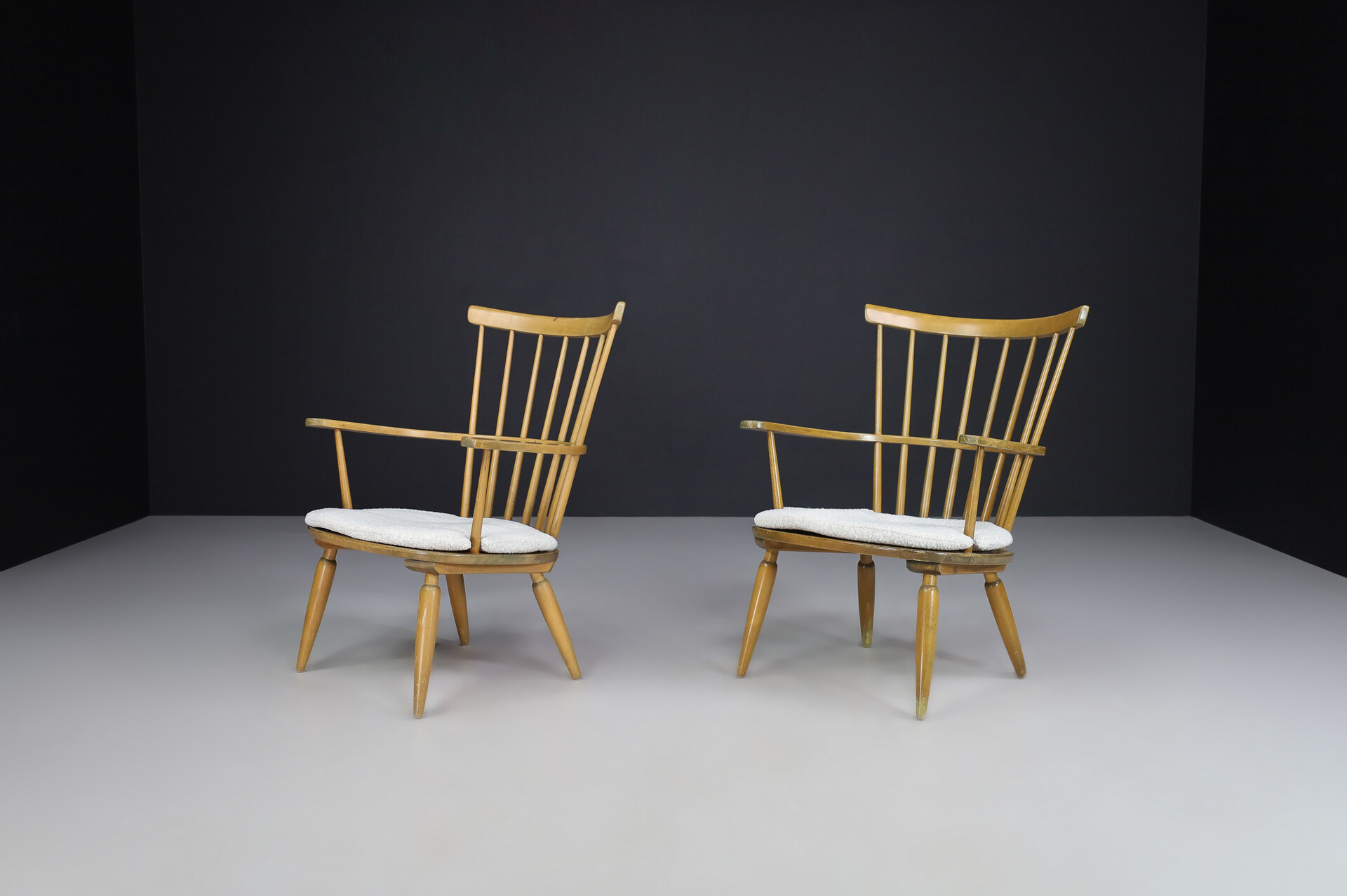 Mid century modern Beechwood Armchairs with New Bouclé cushions for Altheim by Franz Schuster 1950s Austria. Mid-20th century