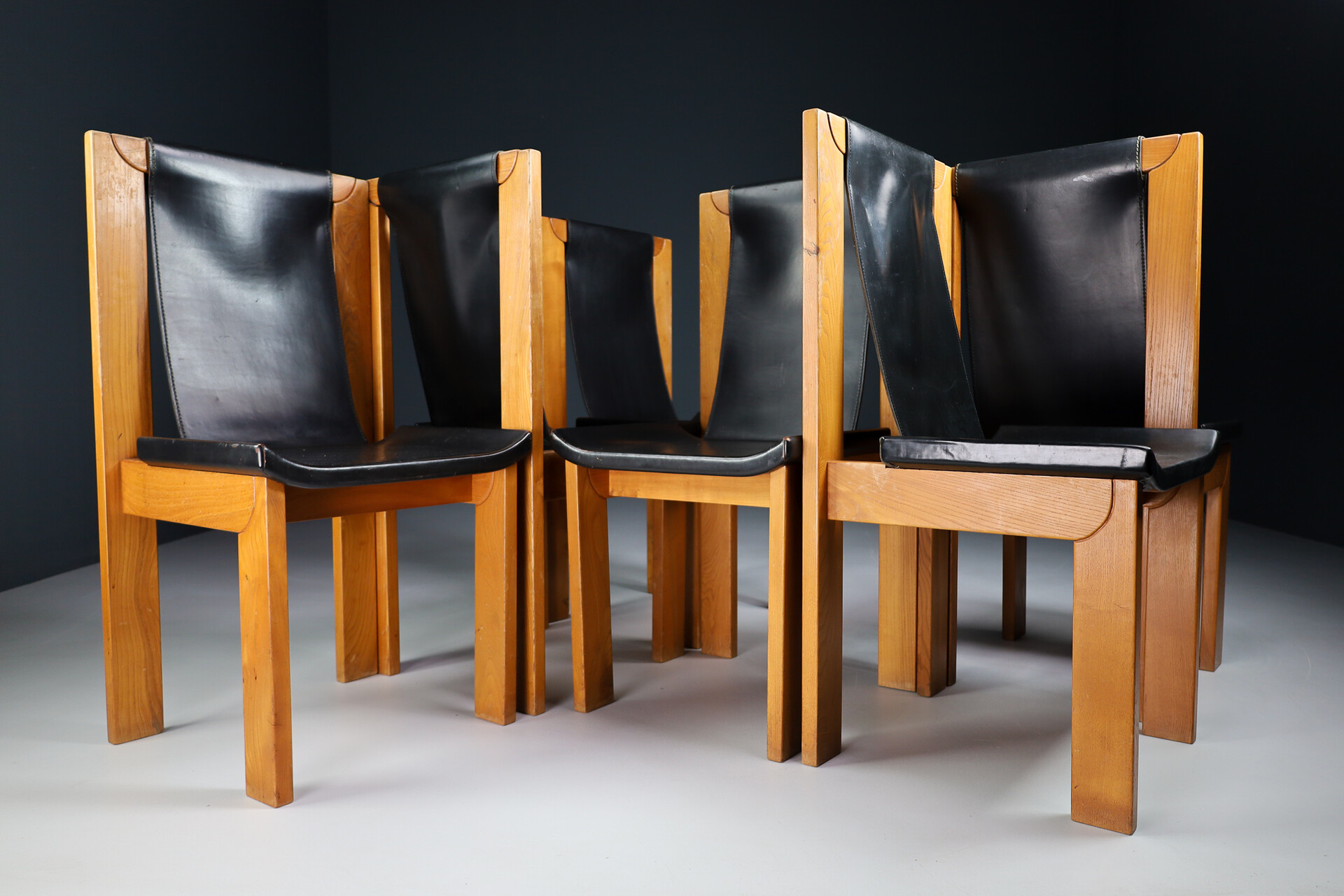 Mid century modern Dining chairs in elm and leather, France 1970s Late-20th century