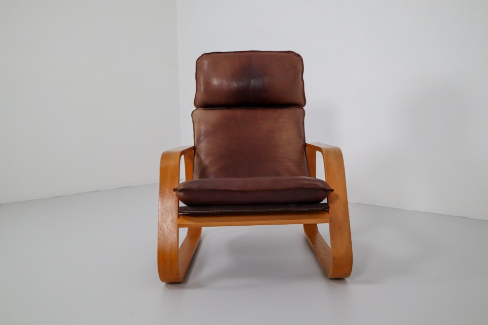 Mid century modern Leather Set of Three Lounge Chairs, Patinated