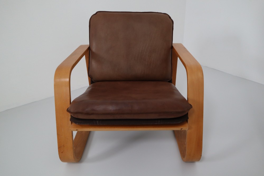 Mid century modern Leather Set of Three Lounge Chairs, Patinated