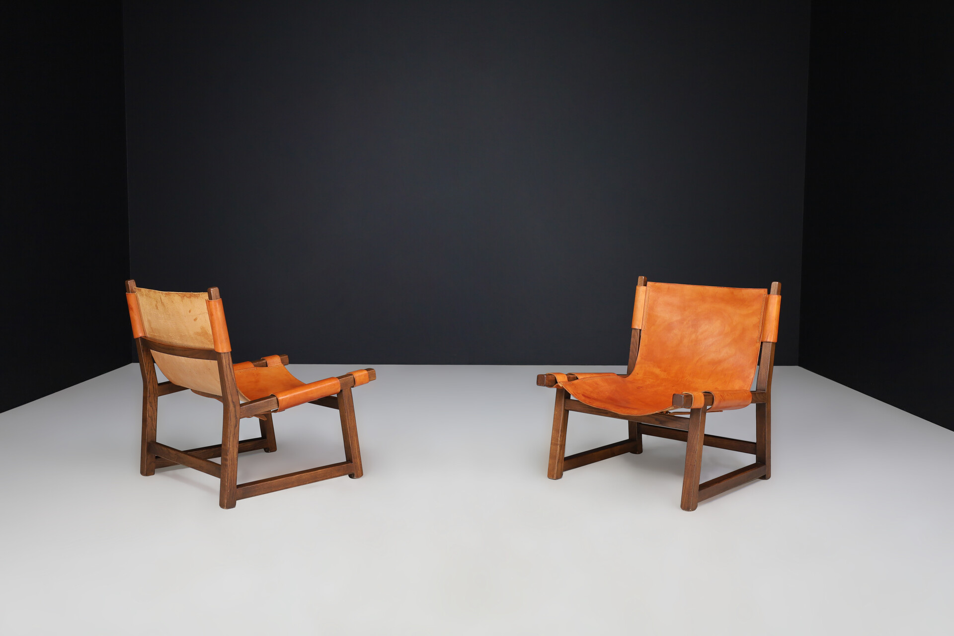 Mid century modern Paco Muñoz pair of 'Riaza' lounge chairs In Walnut and Cognac Leather Spain 1960 Mid-20th century