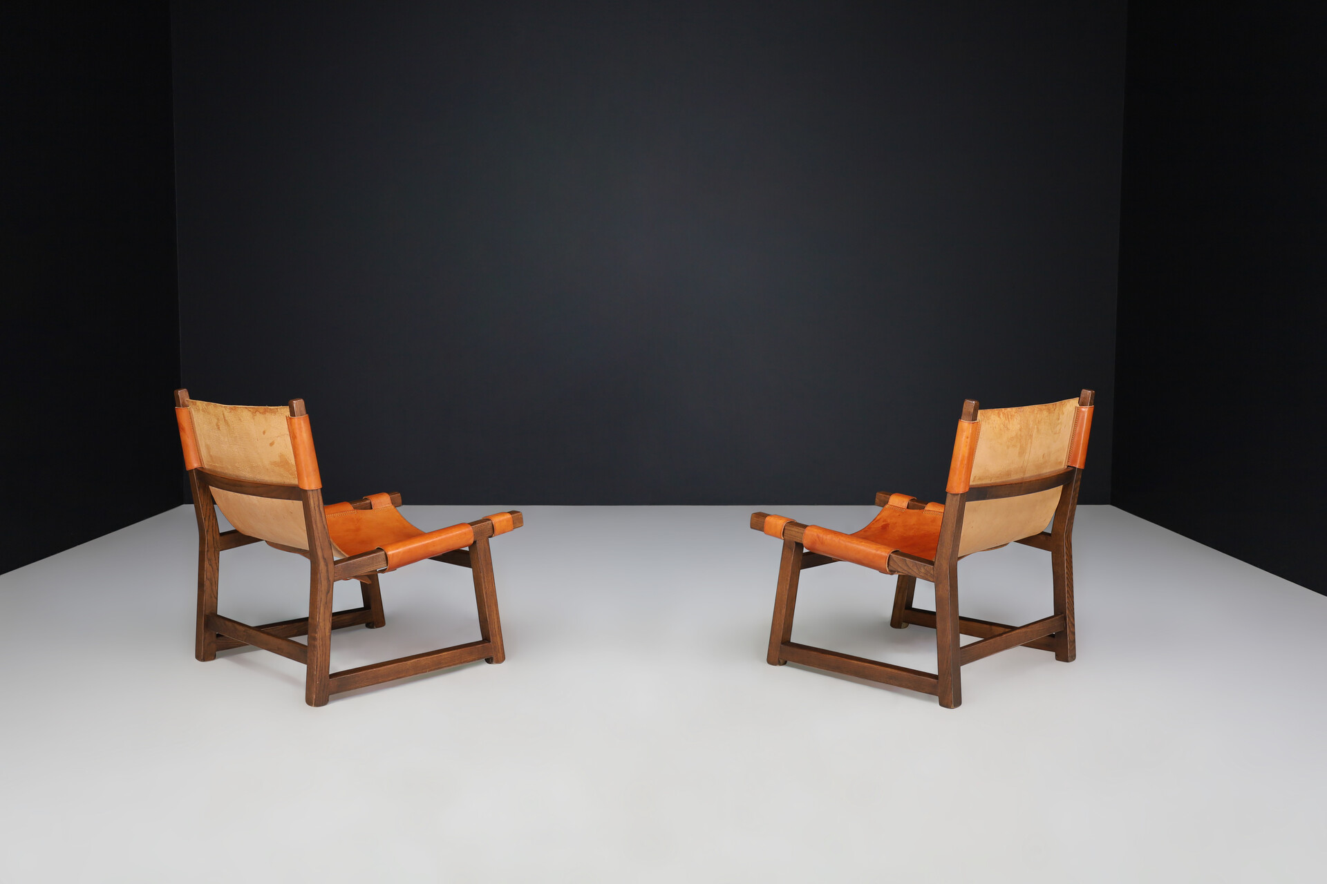 Mid century modern Paco Muñoz pair of 'Riaza' lounge chairs In Walnut and Cognac Leather Spain 1960 Mid-20th century