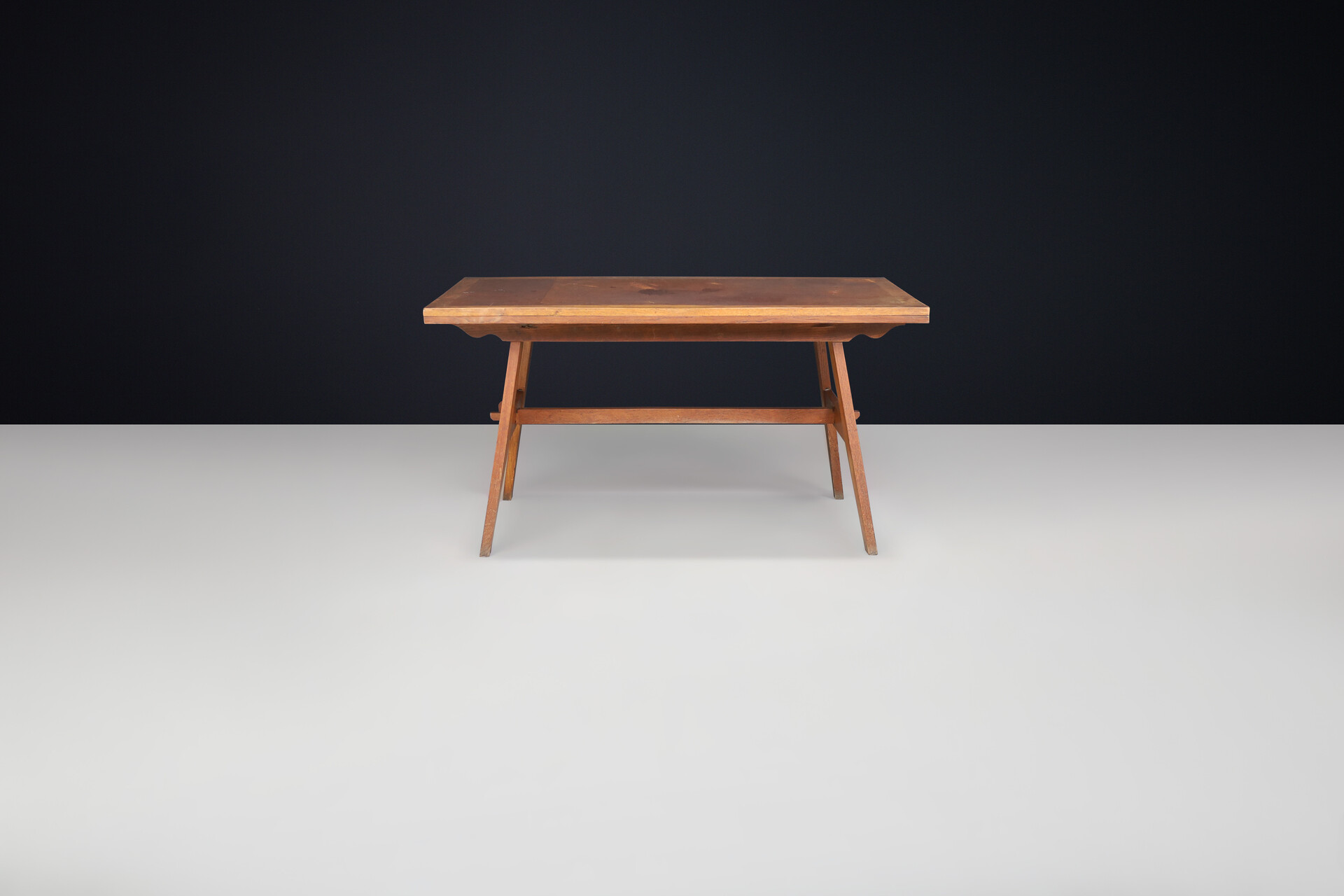 Mid century modern René Gabriel Patinated Oak Reconstruction table, France 1950. Mid-20th century