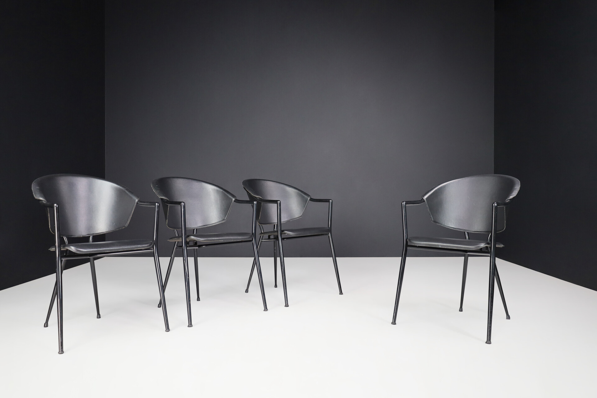 Post modern Phillipe Starck Black leather Armchairs, Italy 1980s Late-20th century