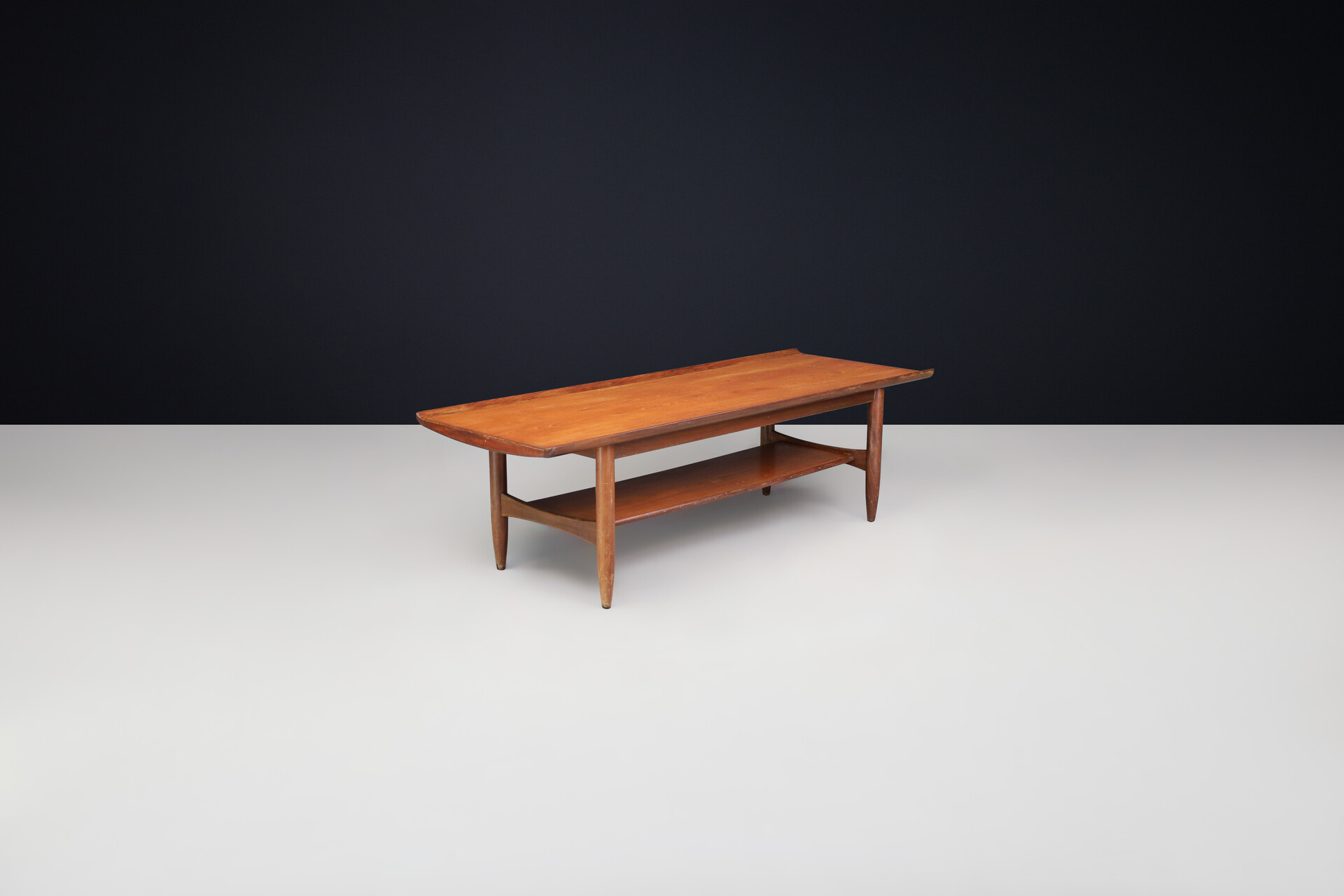 Scandinavian modern Teak coffee table with curved table top , Denmark 1960s Mid-20th century